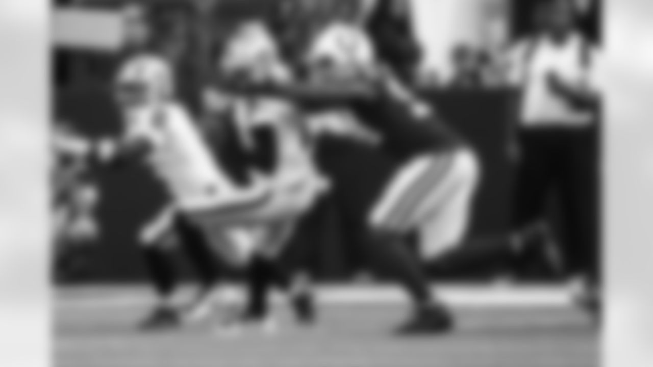 94 - DE Tyquan Lewis