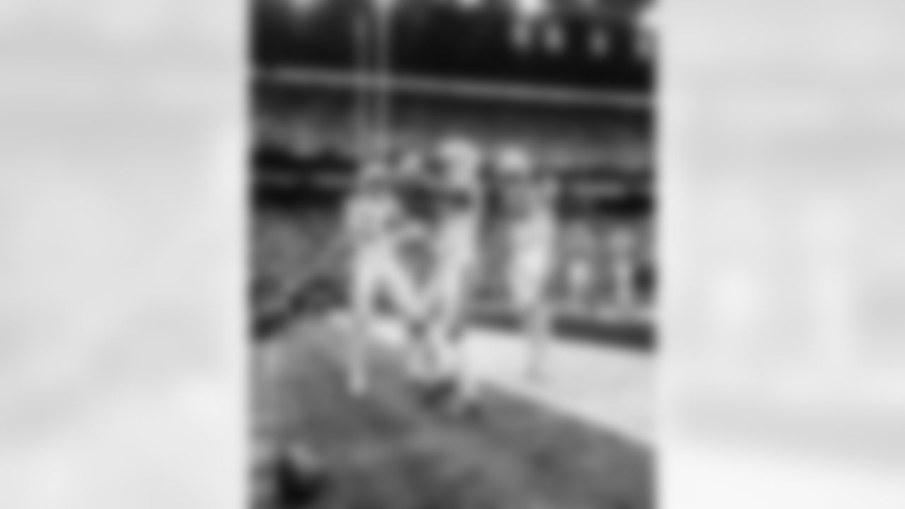 WR Josh Downs #2, G Tanor Bortolini #60 and WR Alec Pierce #14