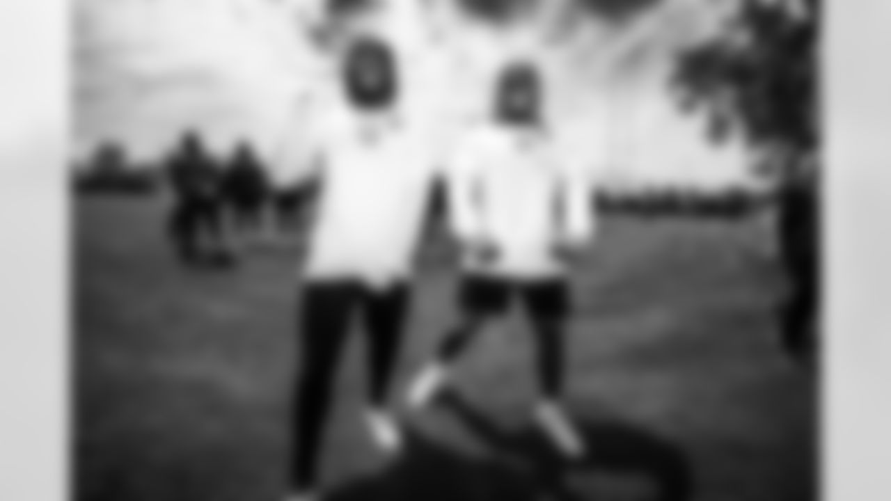 RB Tyler Goodson #31 and RB Jonathan Taylor #28