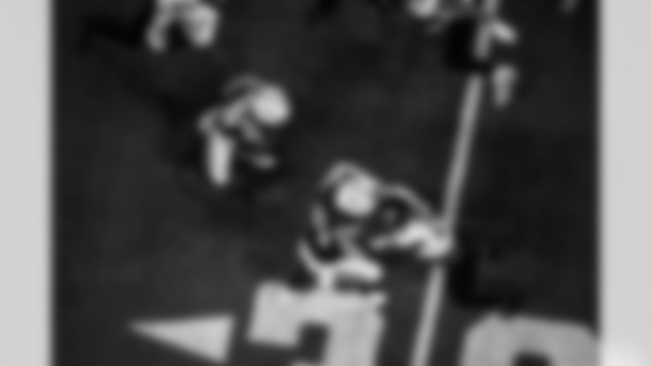 RB Jonathan Taylor #28 and C Danny Pinter #63