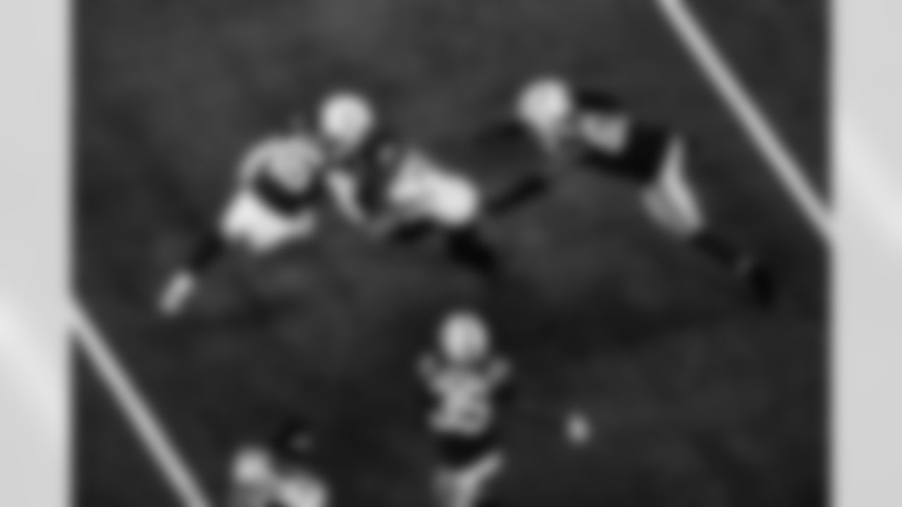 LS Luke Rhodes #46, CB Johnathan Edwards #35 and LB Buddy Johnson #59