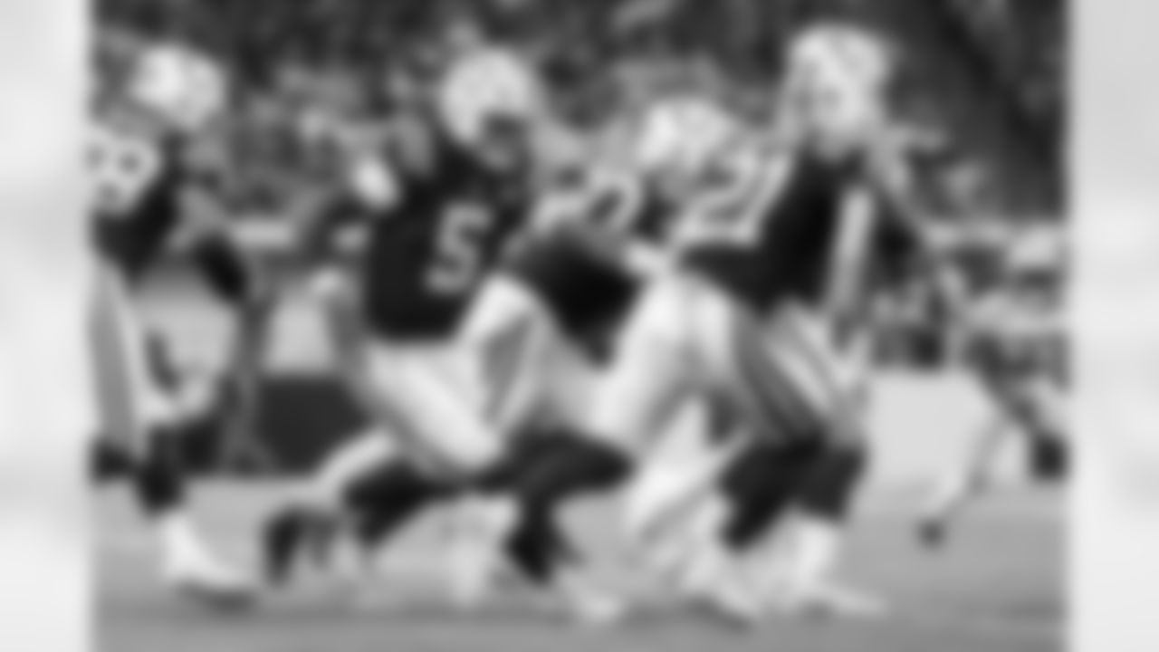QB Anthony Richardson #5 and RB DJ Giddens #21