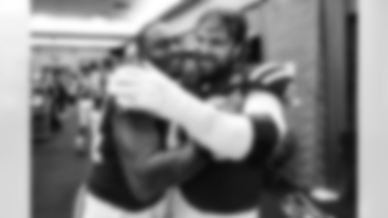 DE Tyquan Lewis #94 and G Tanor Bortolini #60