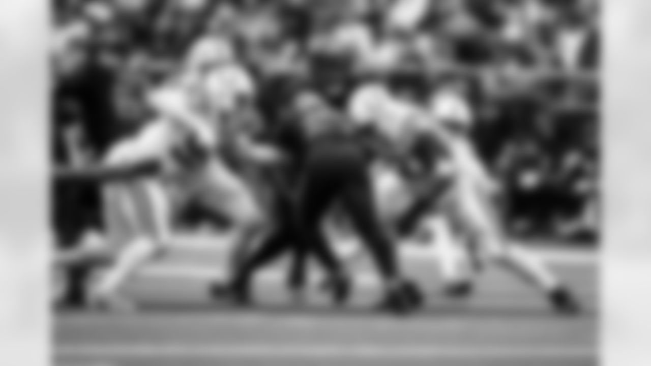 DT Adetomiwa Adebawore #95 and DT Neville Gallimore #92