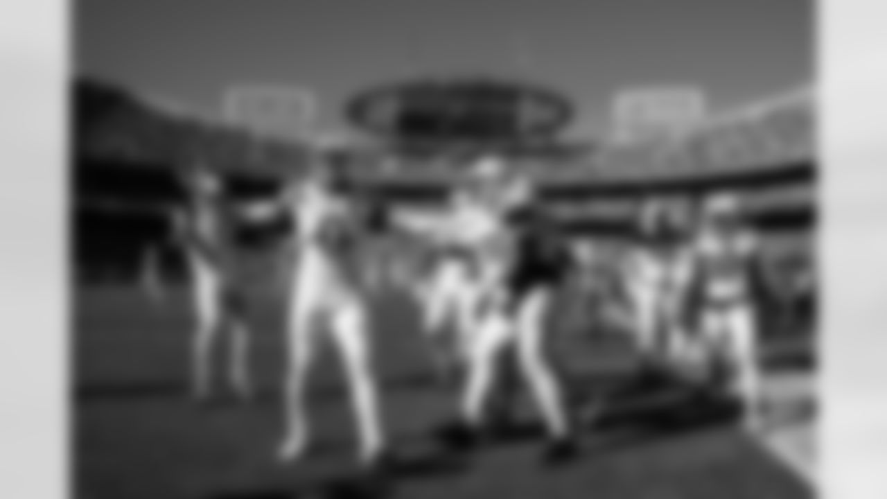 S Camryn Bynum #0, DE Laiatu Latu #97, LB Buddy Johnson #59 and CB Chris Lammons #38