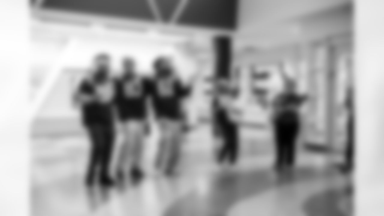 LB Austin Ajiake #58, WR Eli Pancol#83, DE Viliami Fehoko Jr.#61 and Allison B.