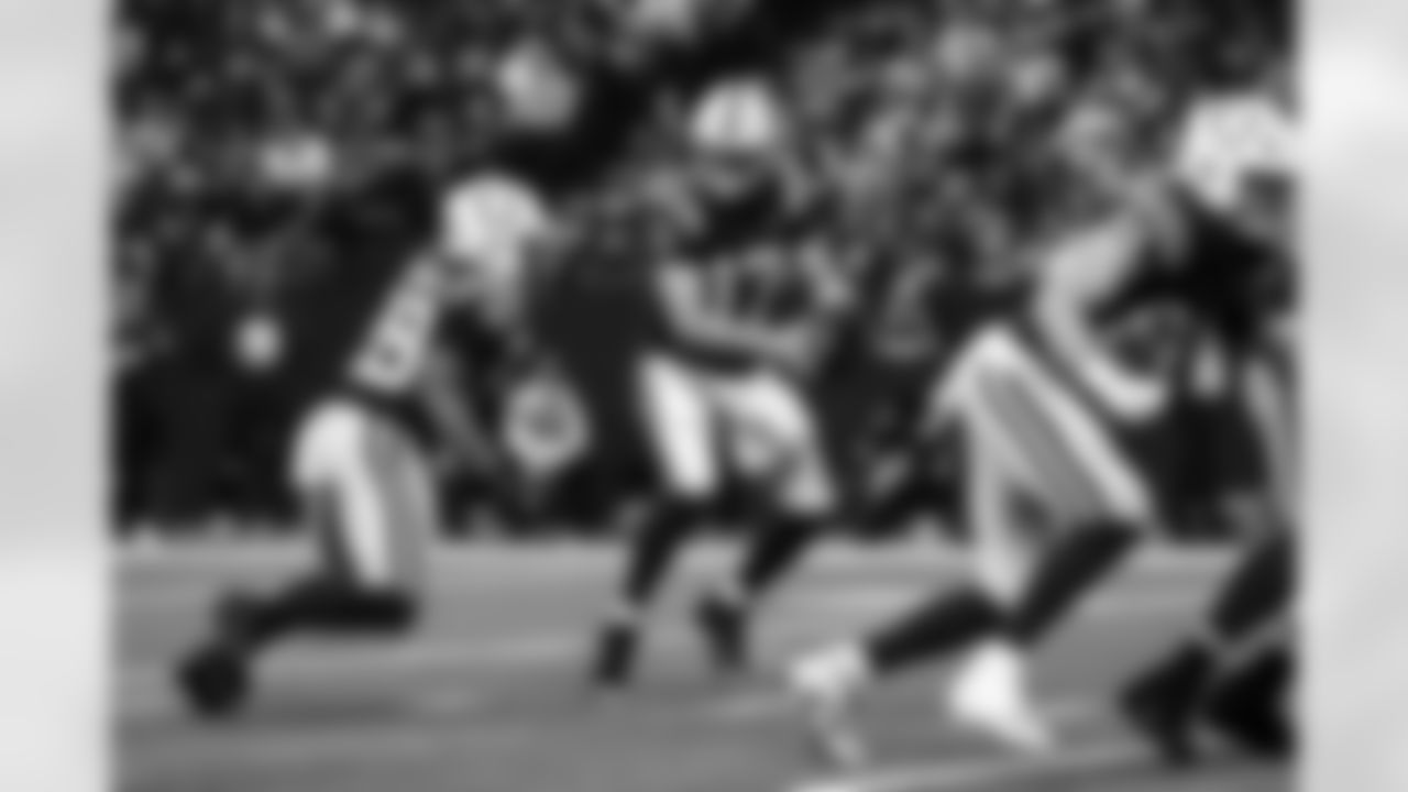 RB Jonathan Taylor #28 and QB Phillip Rivers #17