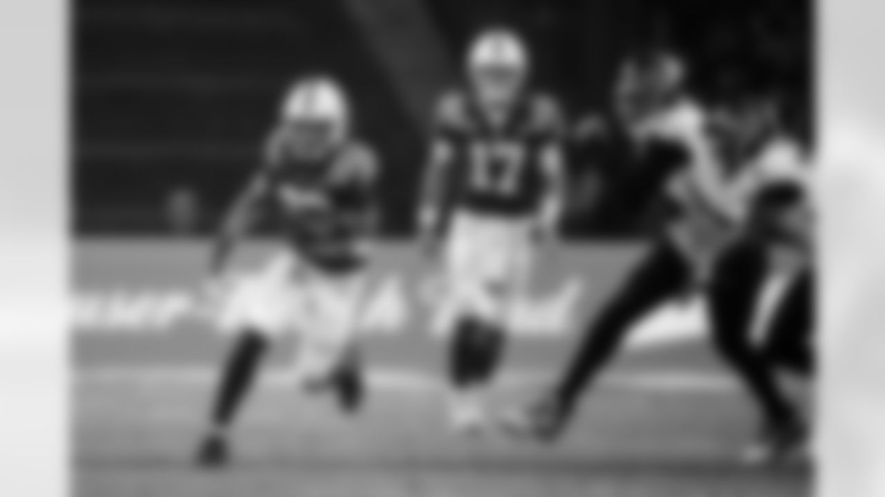 RB Jonathan Taylor #28 and QB Daniel Jones #17