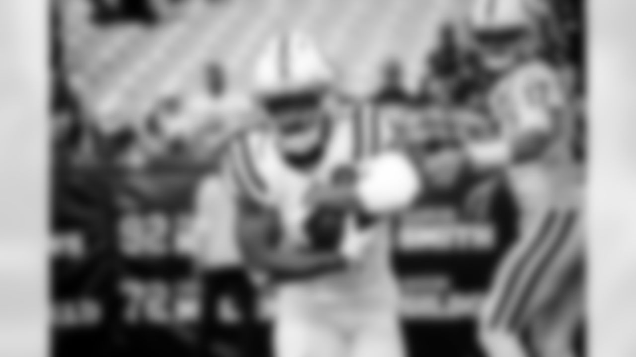 RB Tyler Goodson #31 and QB Daniel Jones #17