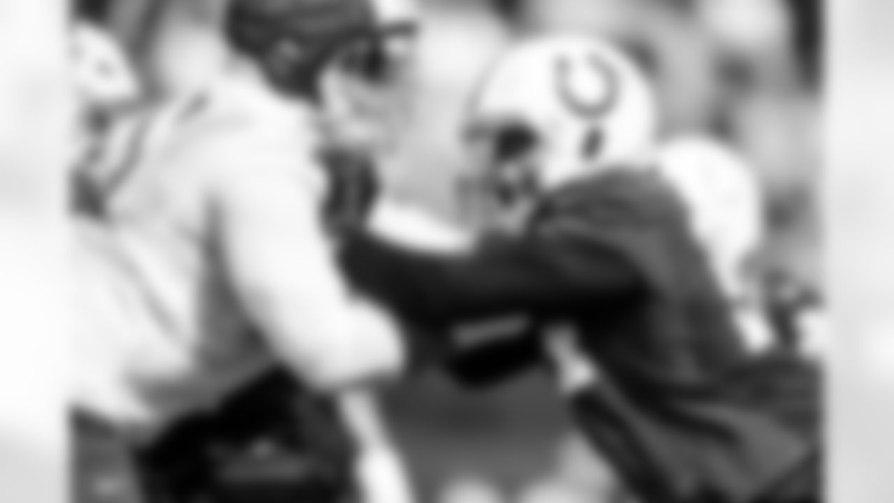 T Jalen Travis #75 and DE Tyquan Lewis #94