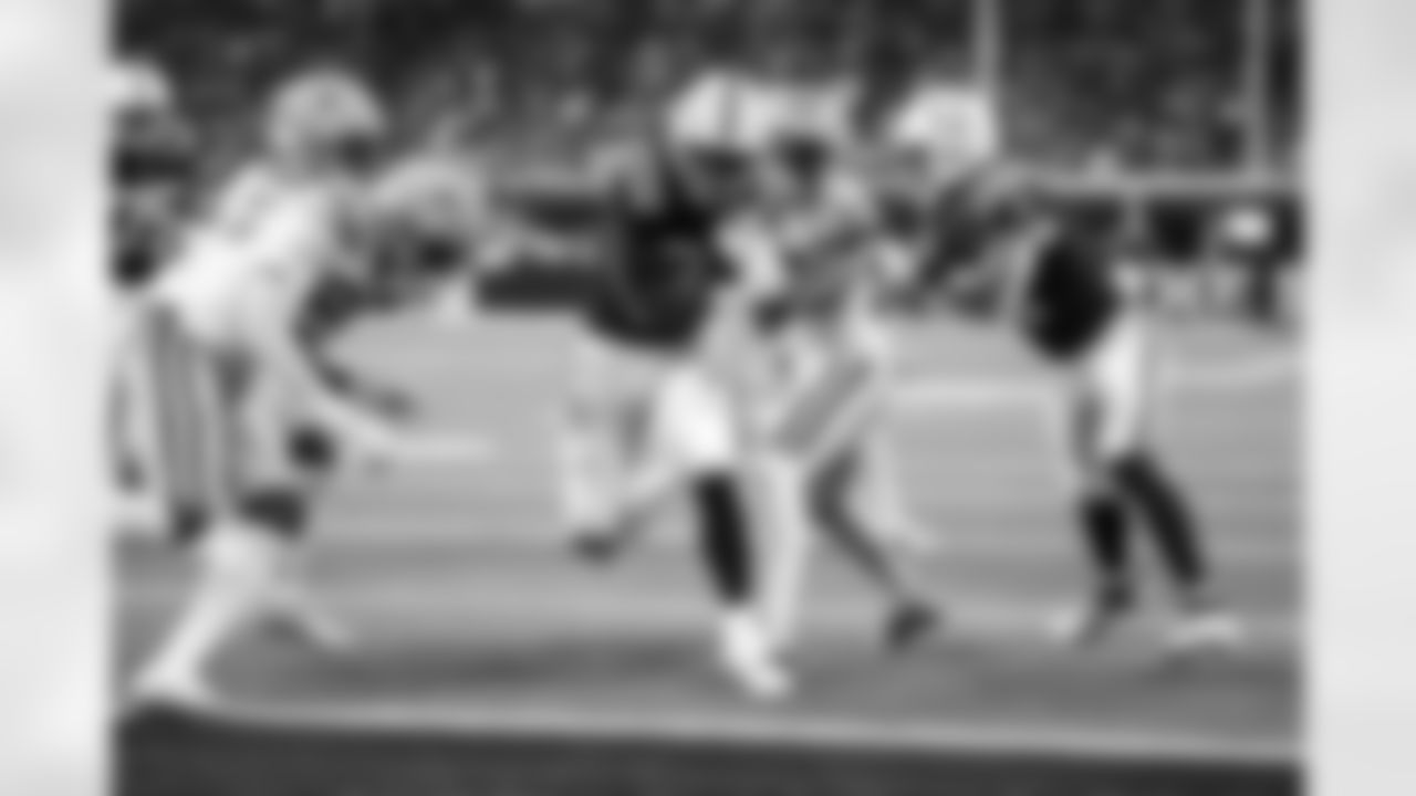 RB DJ Giddens #21