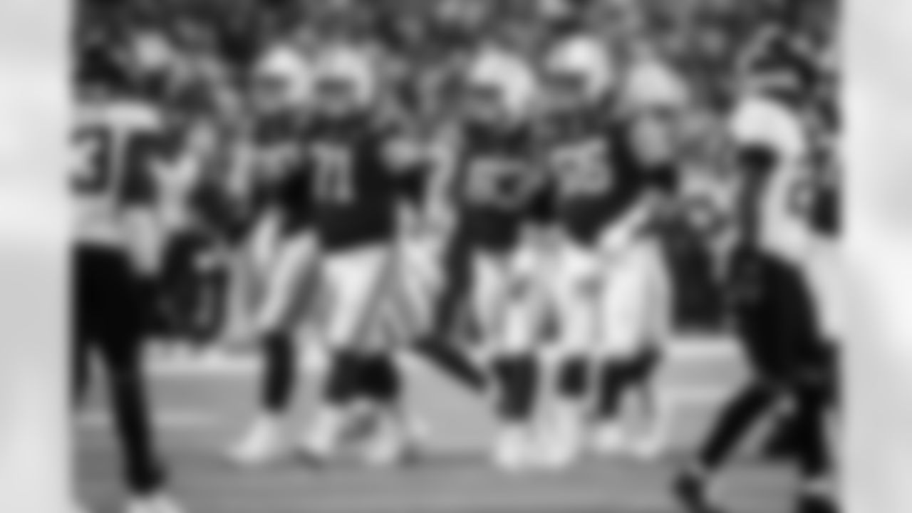 T Jalen Travis #75, G Matt Goncalves #71, C Danny Pinter #63 and G Quenton Nelson #56