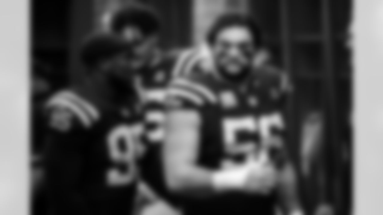 DT Adetomiwa Adebawore #95 and G Quenton Nelson #56