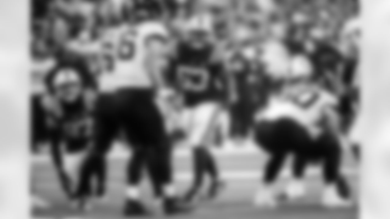 DE Laiatu Latu #97 and LB Germaine Pratt #53