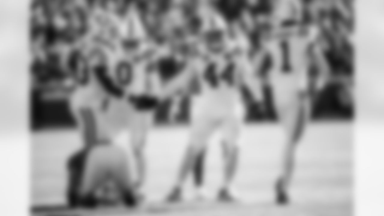 LB Germaine Pratt #53, S Camryn Bynum #0, LB Zaire Franklin #44 and CB Sauce Gardner #1