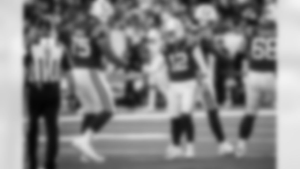T Jalen Travis #75 and K Michael Badgley #12