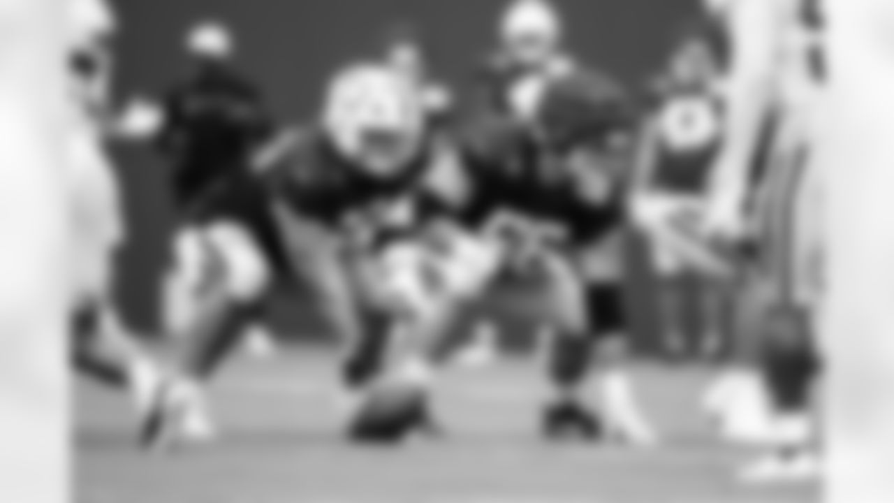 G Tanor Bortolini #60 and G Quenton Nelson #56