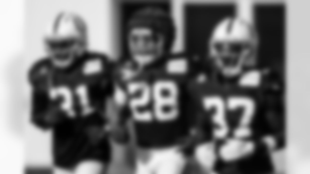 RB Tyler Goodson #31, RB Jonathan Taylor #28 and RB Ulysses Bentley IV #37