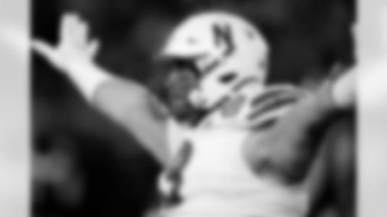 Nebraska defensive lineman Ty Robinson celebrates during the second half of an NCAA college football game against Iowa, Friday, Nov. 29, 2024, in Iowa City, Iowa. (AP Photo/Charlie Neibergall)