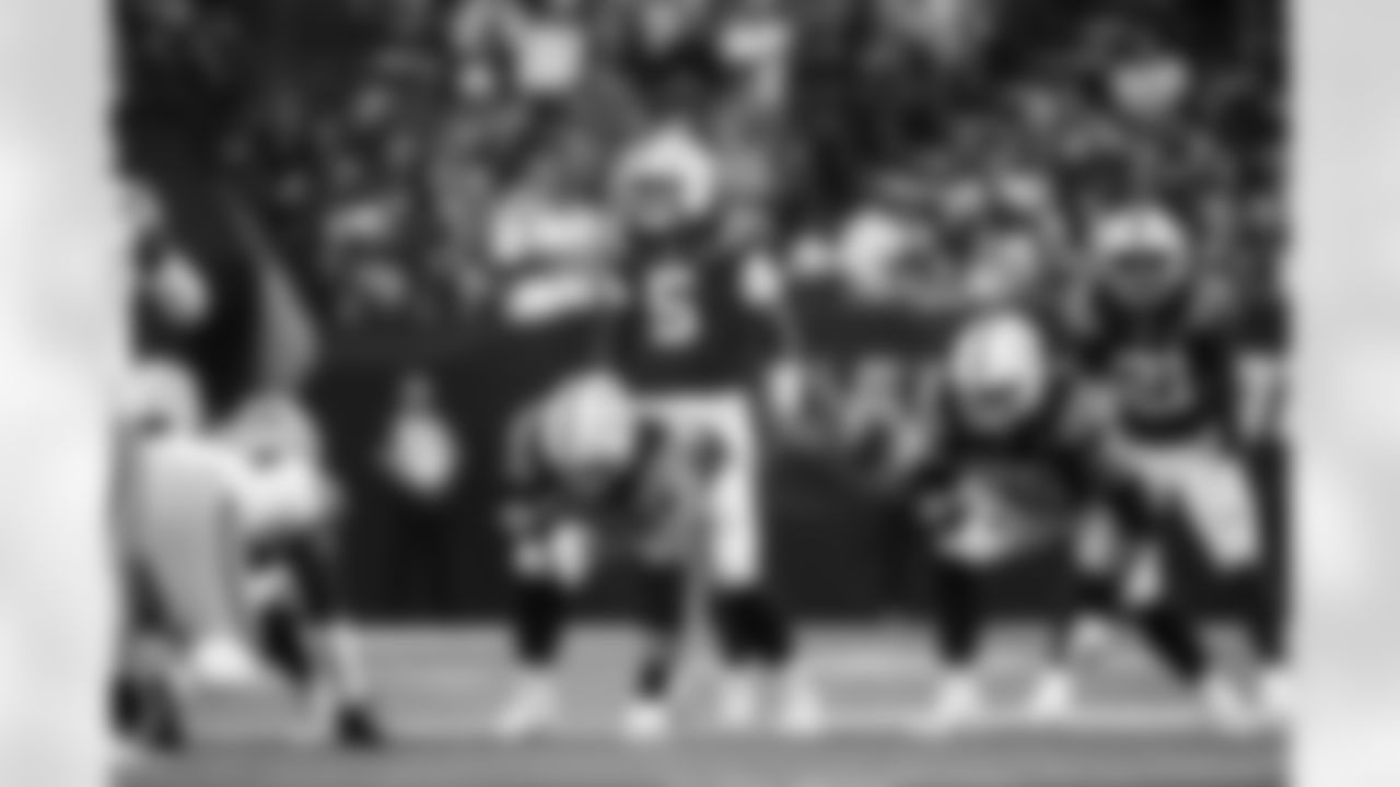 QB Anthony Richardson #5, G Dalton Tucker #68, RB DJ Giddens #21 and T Jalen Travis #75