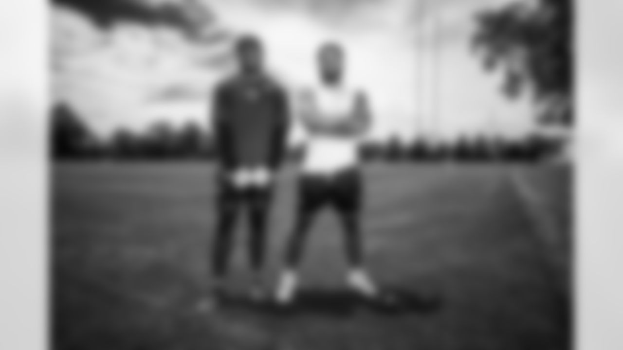 LB Jacob Phillips #53 and LB Austin Ajiake #58