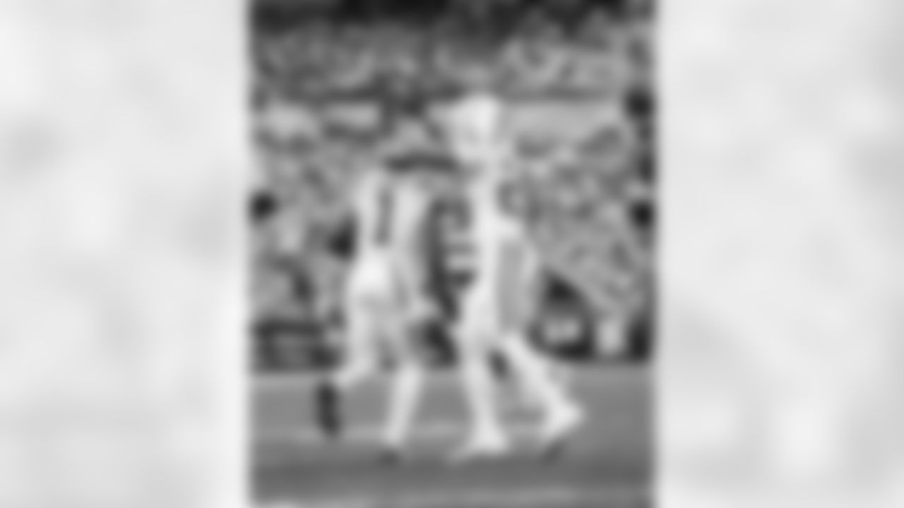 WR Josh Downs #1 and RB Jonathan Taylor #28