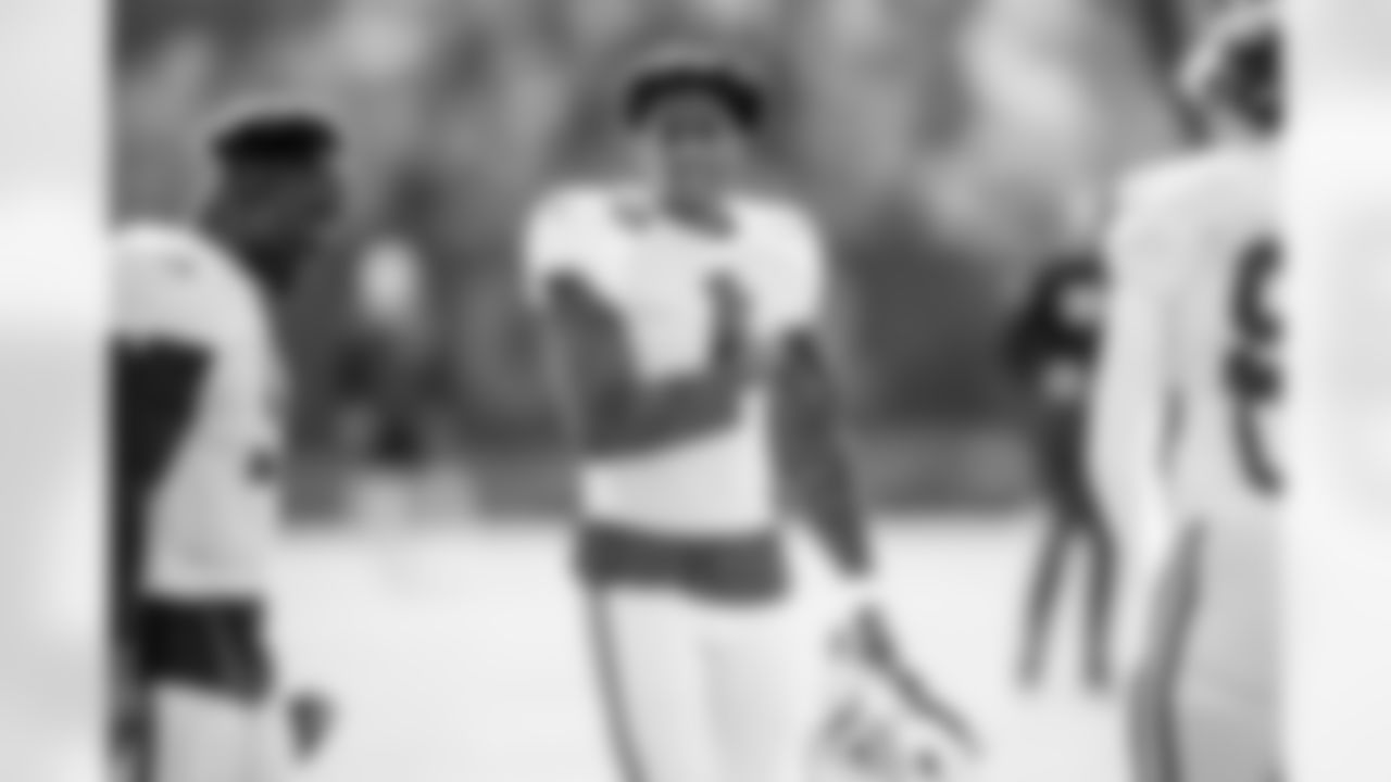 DE Kwity Paye #51 and CB Sauce Gardner #1