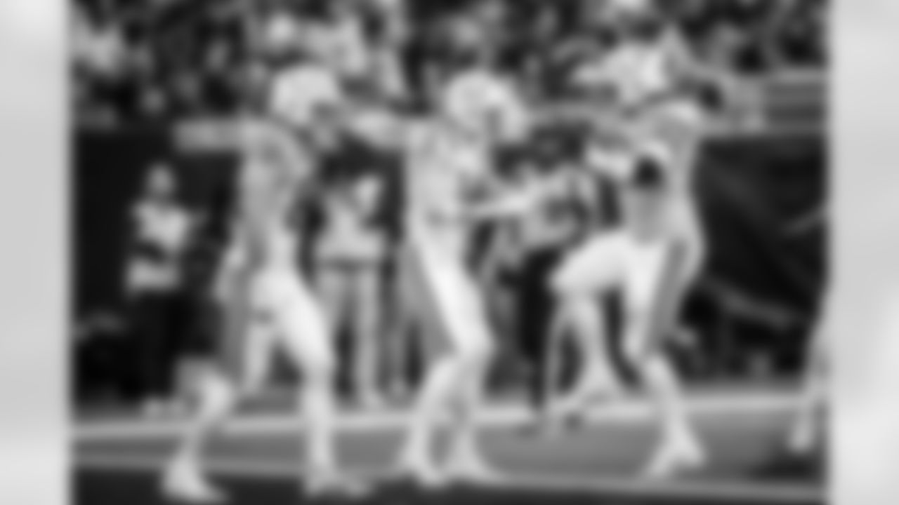 TE Tyler Warren #84, WR Alec Pierce #14 and C Tanor Bortolini #60