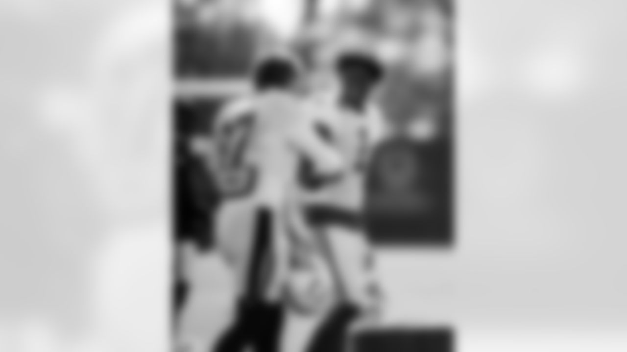 DE Laiatu Latu #97 and CB Sauce Gardner #1