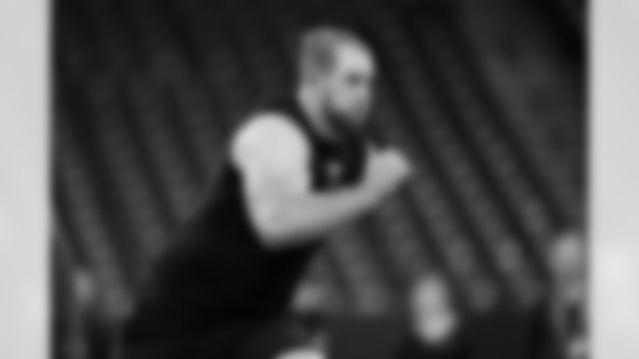 Washington offensive lineman Carver Willis (54) participates in a drill during the 2026 NFL Scouting Combine on Sunday, March 1, 2026 in Indianapolis, Indiana. (Cooper Neill/NFL)