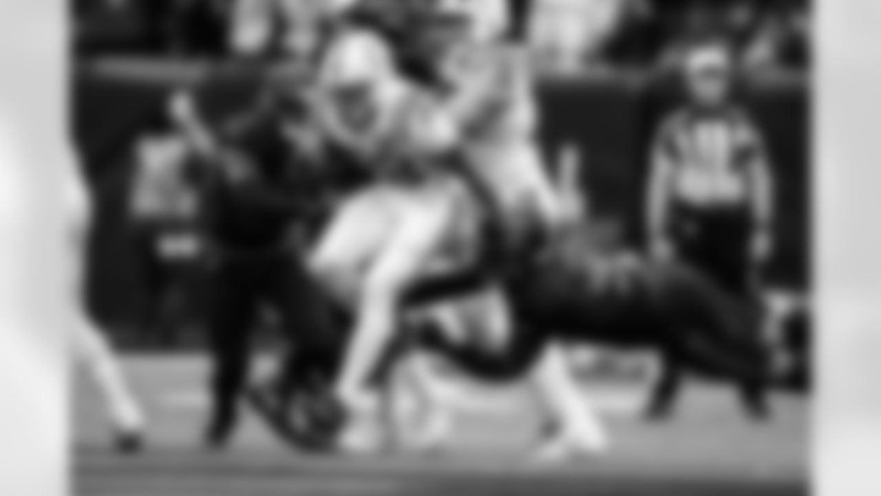 RB Jonathan Taylor #28 and T Bernhard Raimann #79