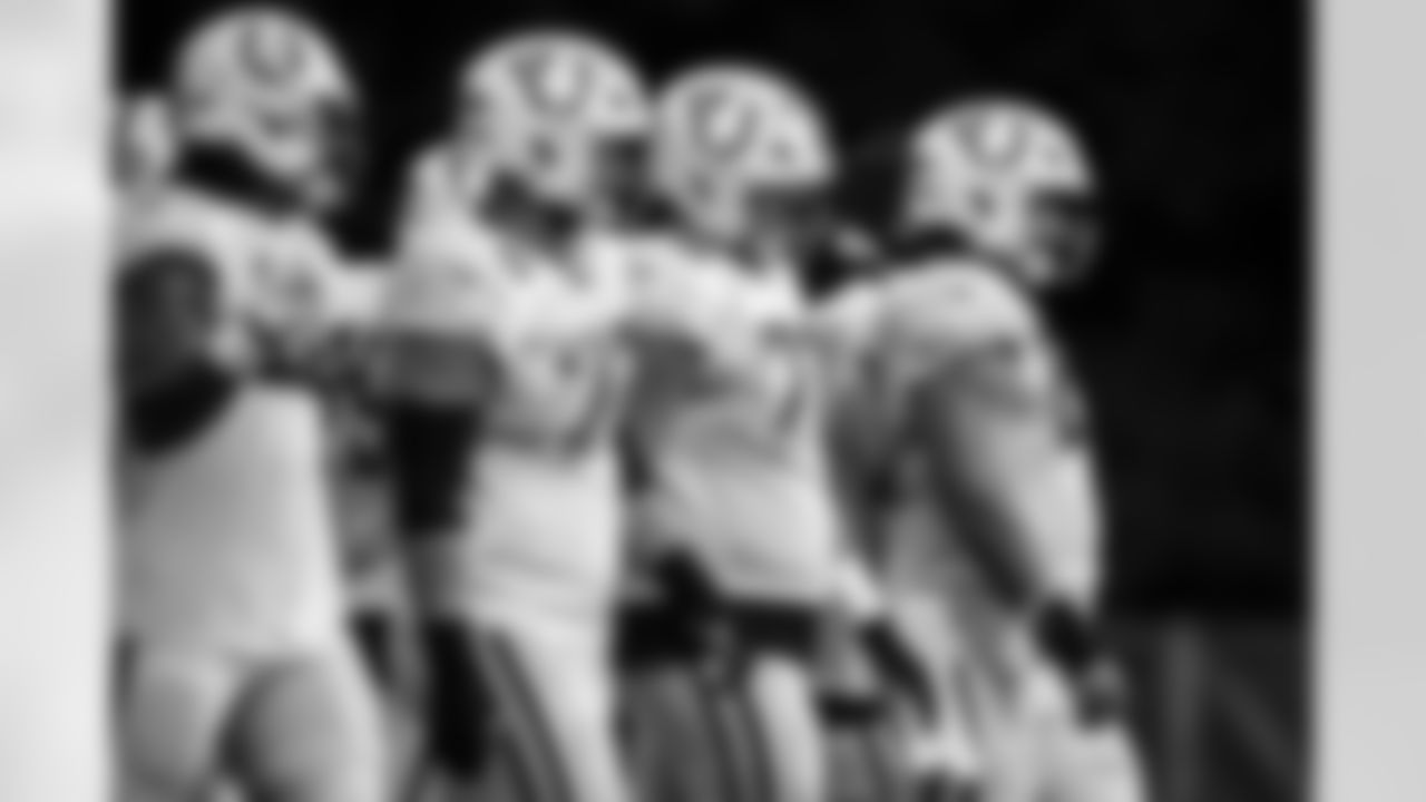 TE Drew Ogletree #85, T Braden Smith #72, T Matt Goncalves #71 and G Tanor Bortolini #60
