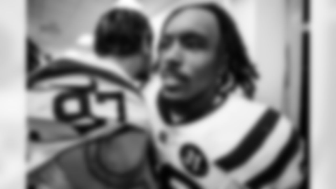 DE Laiatu Latu #97 and S Nick Cross #20