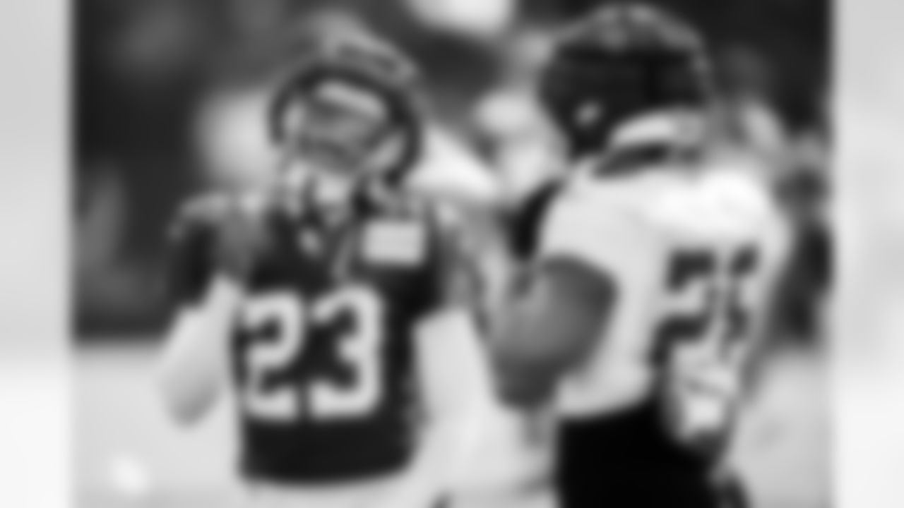 CB Kenny Moore II #23 and RB Jonathan Taylor #28