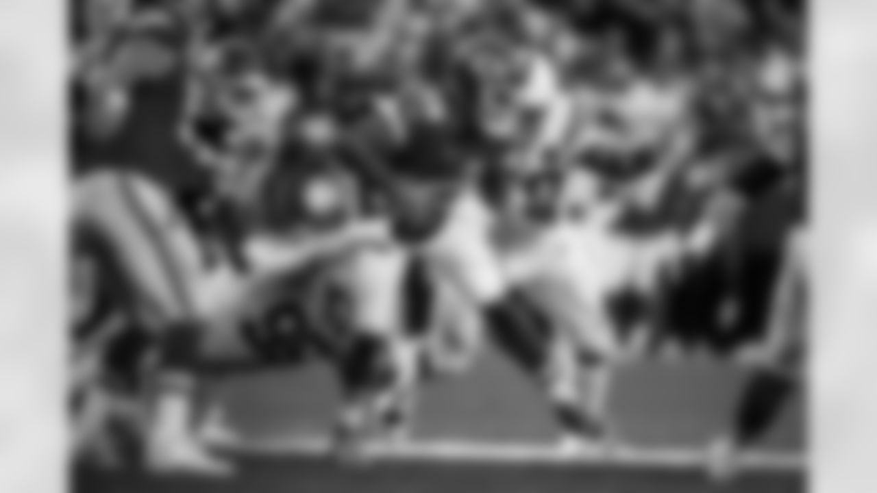 DT Adetomiwa Adebawore #95 and DT Grover Stewart #90