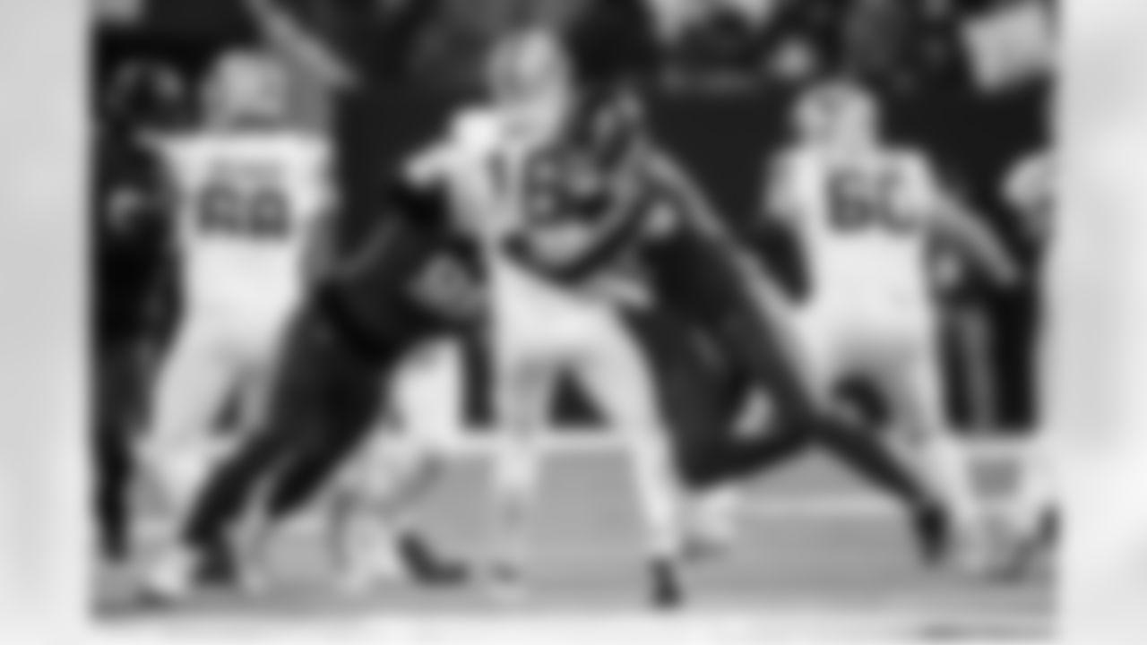 DT DeForest Buckner #99 and DE Laiatu Latu #97