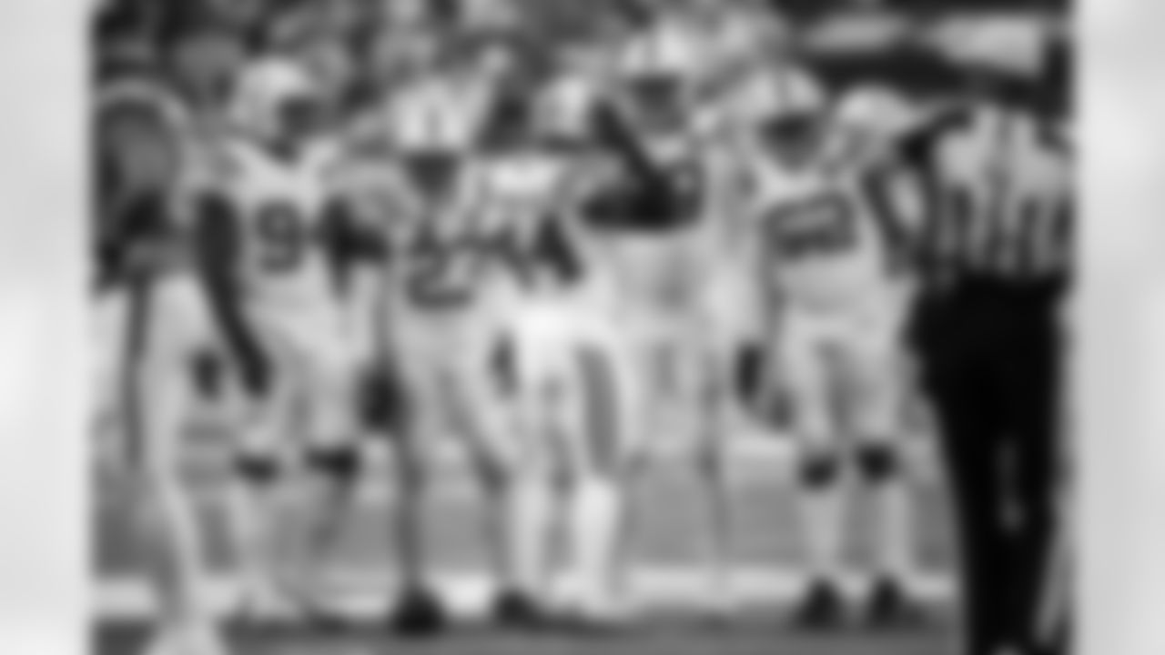 DE Tyquan Lewis #94, CBKenny Moore II#23, CB Kenny Moore II #23, LBZaire Franklin#44 and G Tanor Bortolini #60