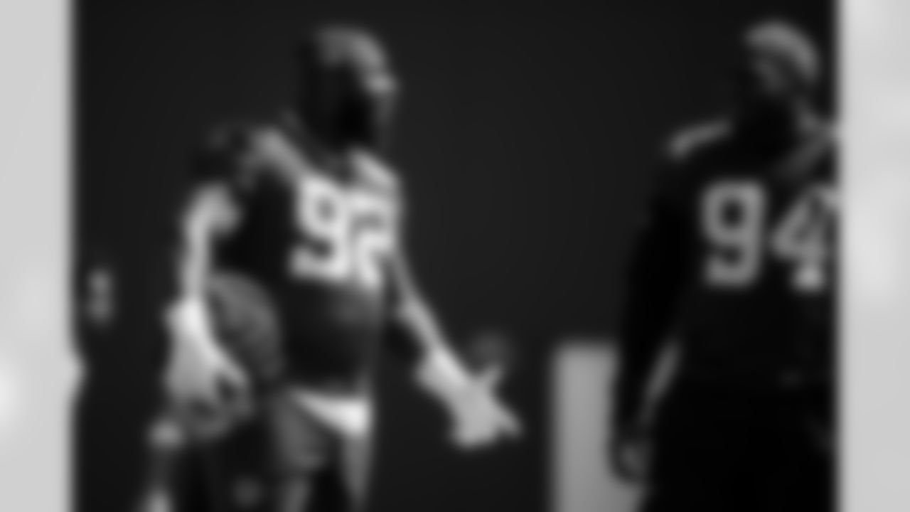 DT Neville Gallimore #92 and DE Tyquan Lewis #94