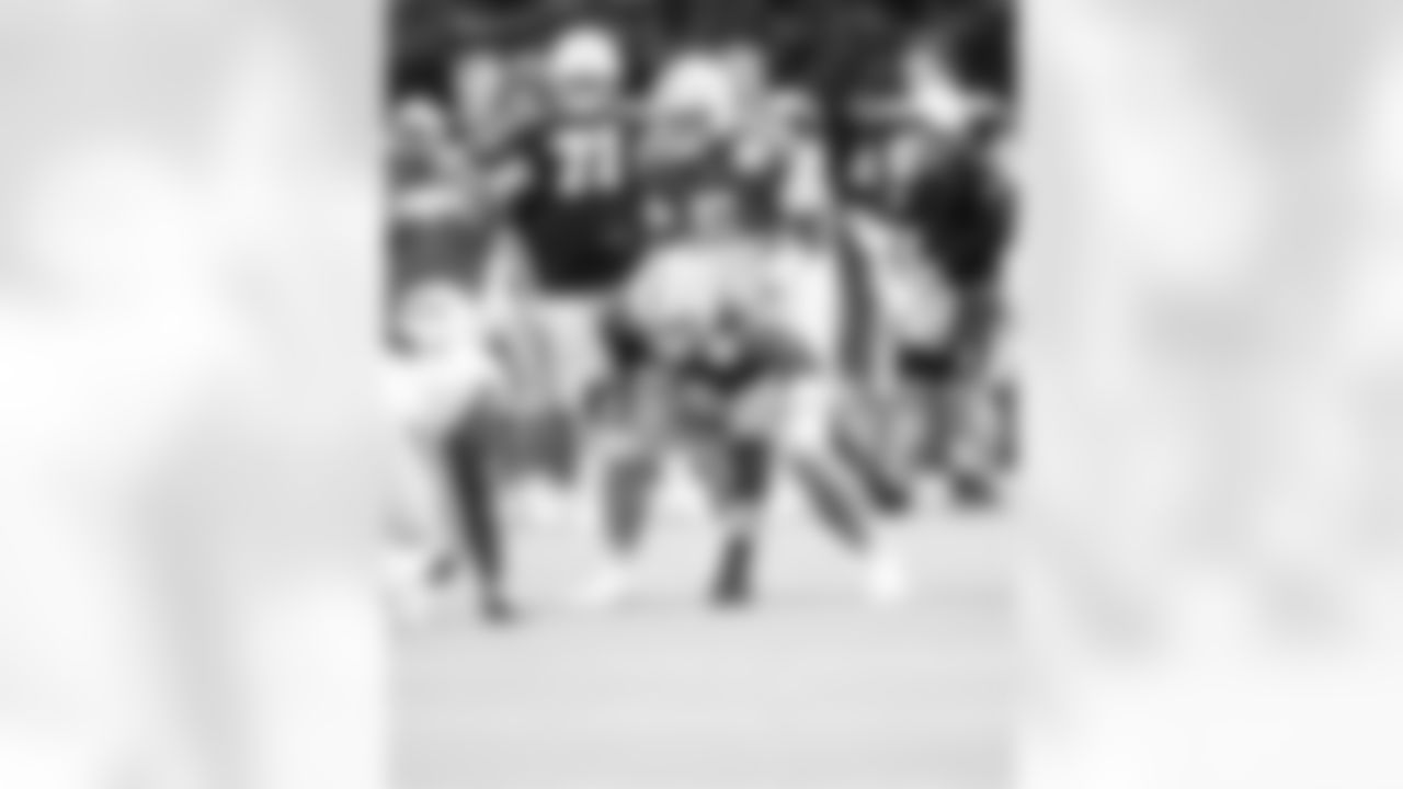 G Dalton Tucker #68 and QB Anthony Richardson #5