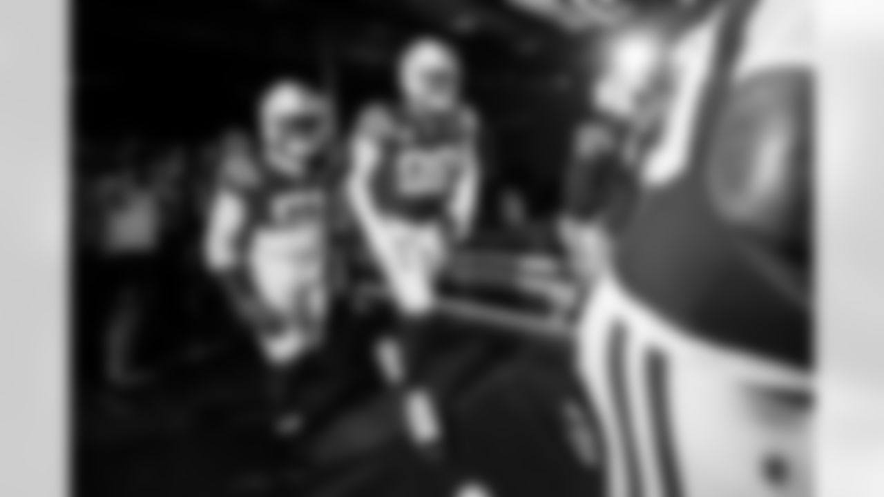 DE Kwity Paye #51 and DL DeForest Buckner #99