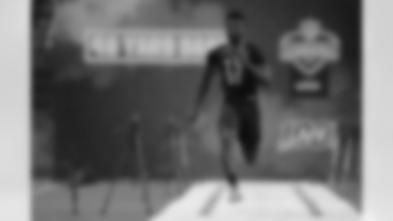 Malone wide receiver Ashton Dulin runs the 40-yard dash at the NFL football scouting combine in Indianapolis, Saturday, March 2, 2019. (AP Photo/Michael Conroy)