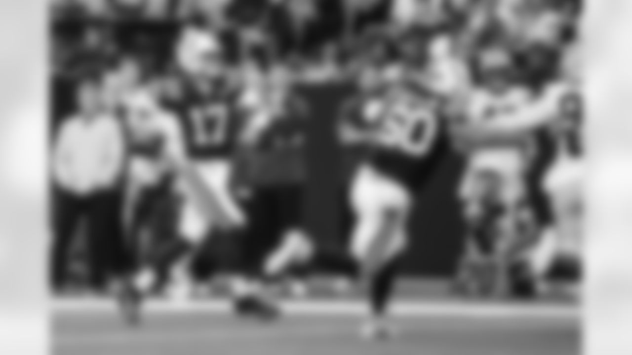 QB Daniel Jones #17 and G Tanor Bortolini #60