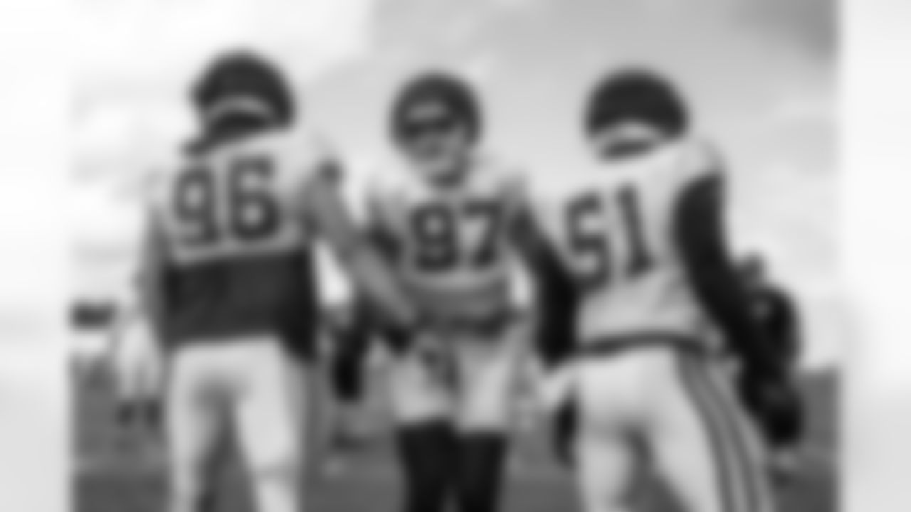 DT Taven Bryan #96, DE Laiatu Latu #97 and DE Kwity Paye #51