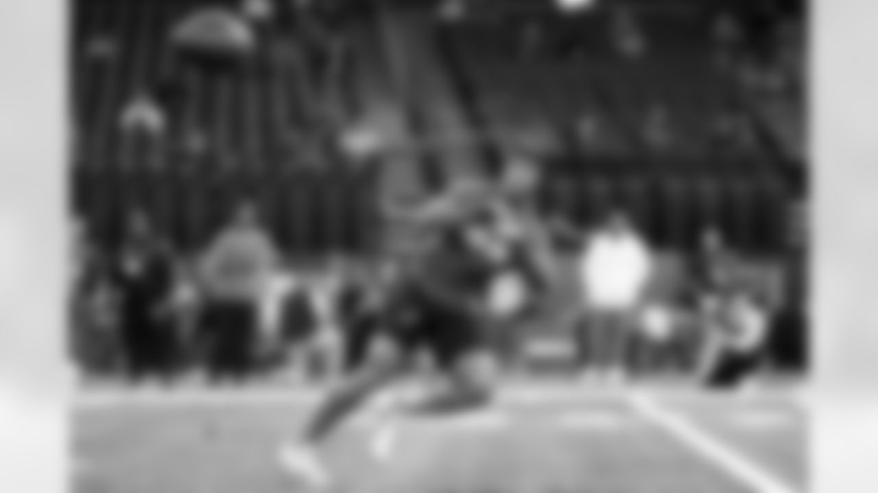 North Carolina wide receiver Josh Downs runs a drill at the NFL football scouting combine in Indianapolis, Saturday, March 4, 2023. (AP Photo/Michael Conroy)