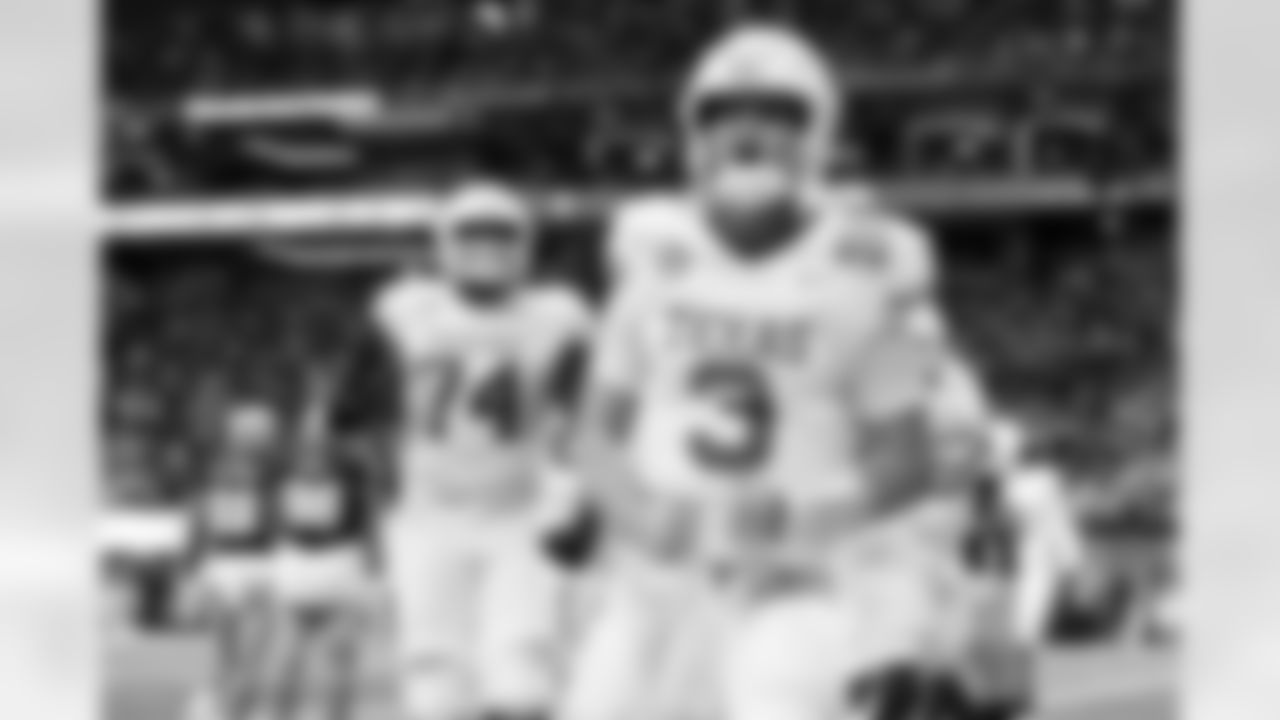 Texas quarterback Quinn Ewers (3) celebrates scoring a touchdown during the Peach Bowl College Football Playoff game against Arizona State, Wednesday, Jan. 1, 2025, in Atlanta. (Logan Bowles via AP)