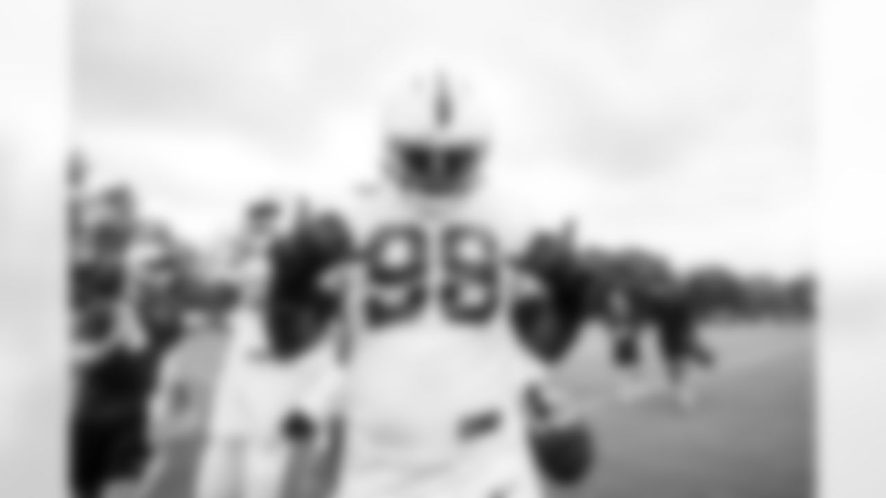 DT Josh Tupou #69 and DT Eric Johnson II #98