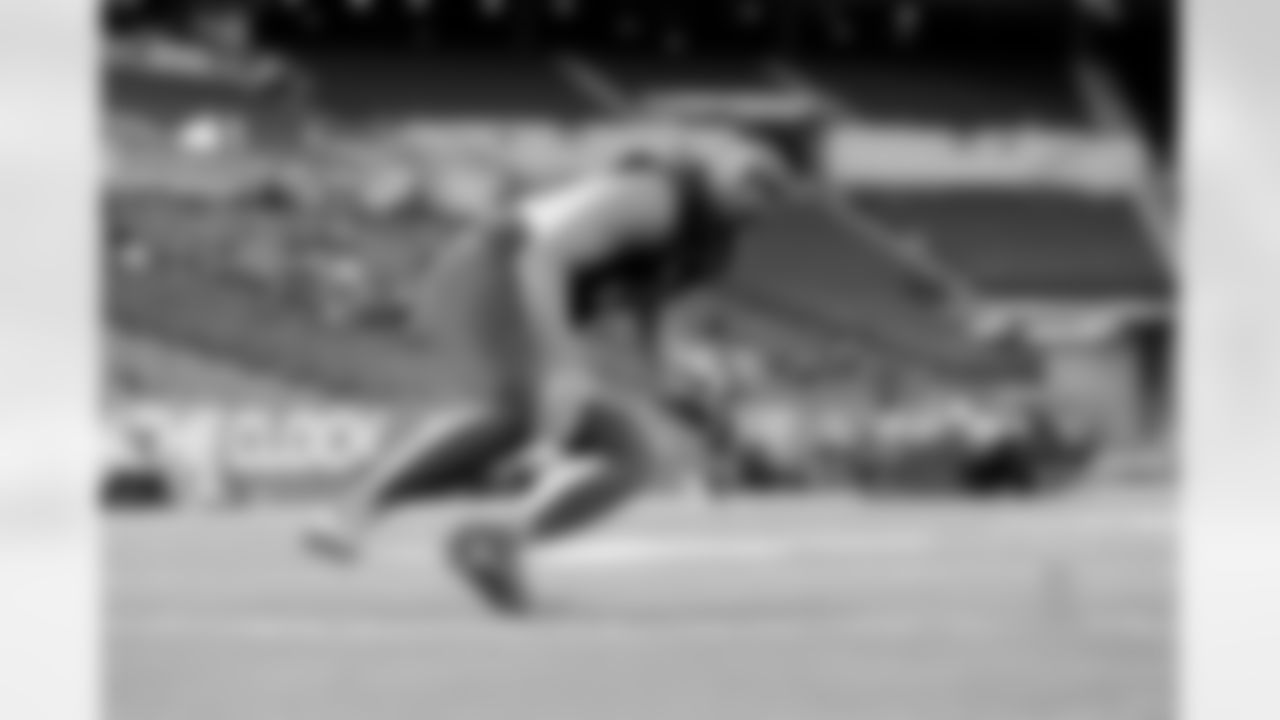 Oregon defensive lineman Defo Buckner performs a drill at the NFL football scouting combine Sunday, Feb. 28, 2016, in Indianapolis. (AP Photo/Gregory Payan)
