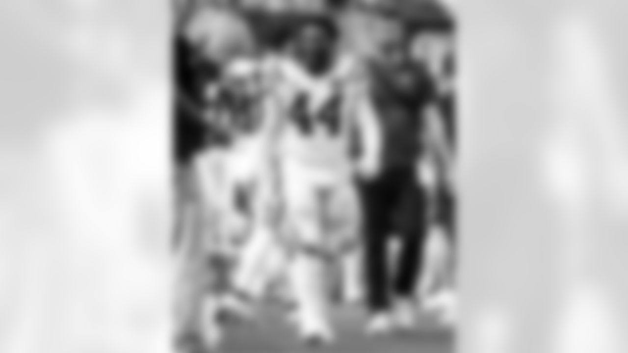 LB Zaire Franklin #44 and Brandon Seitz - Equipment Coordinator