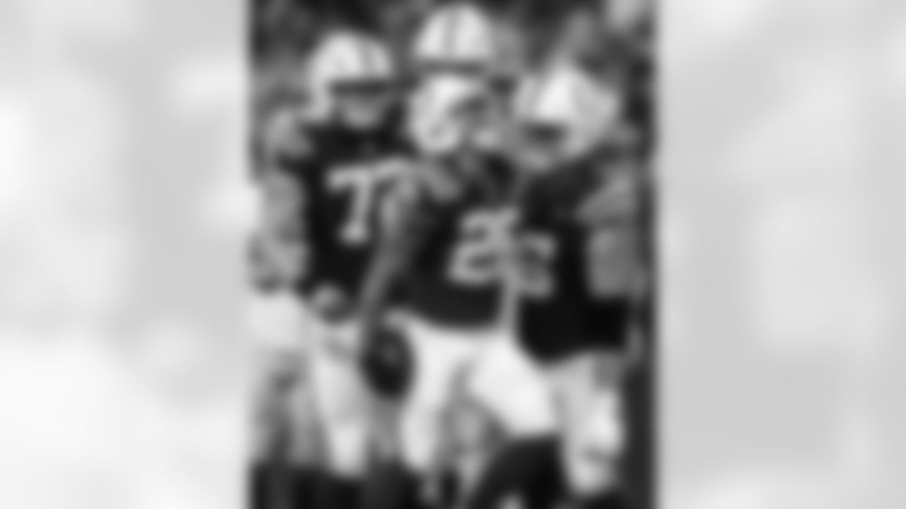 T Braden Smith #72, RB Ameer Abdullah #26 and OL Quenton Nelson #56