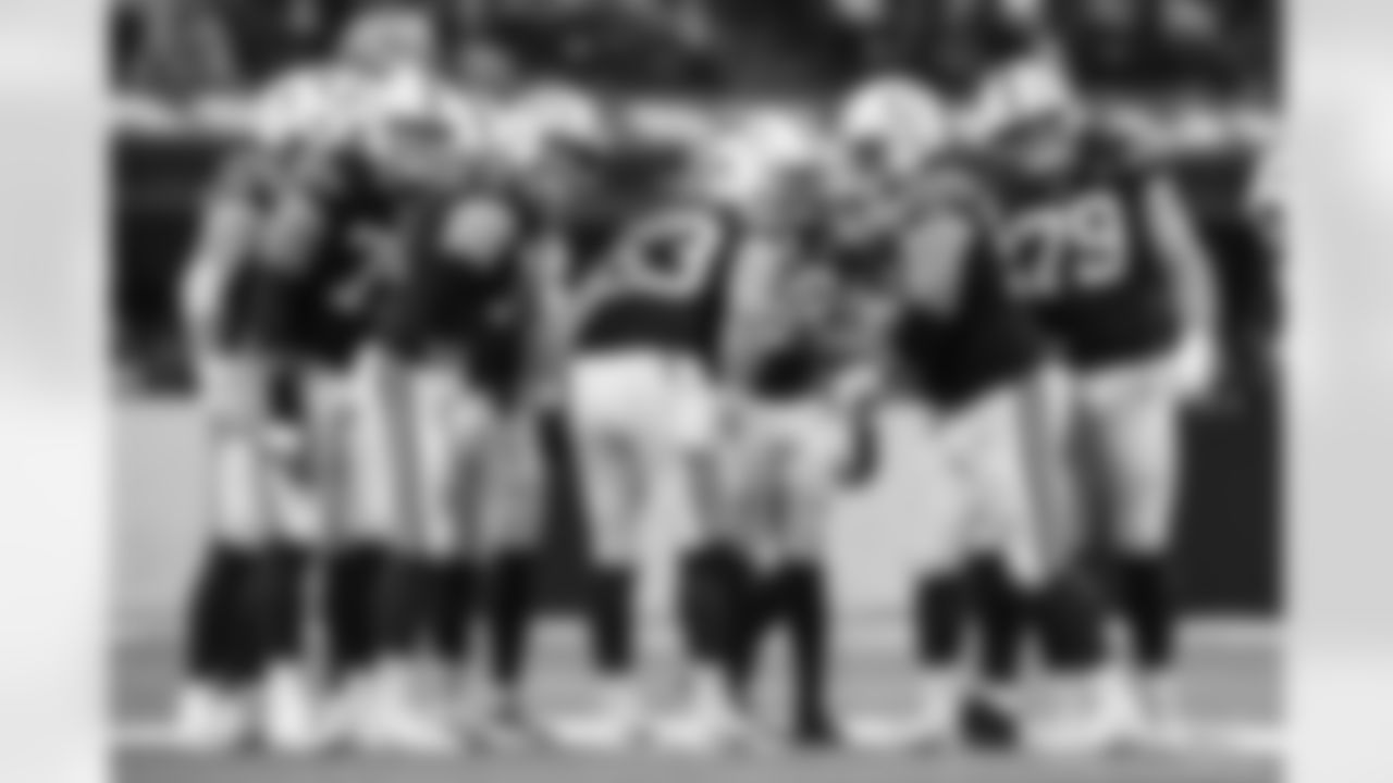 T Jalen Travis #75, G Matt Goncalves #71, C Danny Pinter #63, RB Jonathan Taylor #28, G Quenton Nelson #56 and T Bernhard Raimann #79